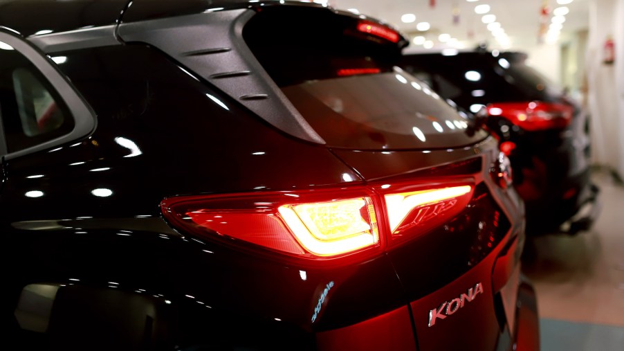 A Hyundai Motor Co. Kona electric vehicle stands on display with other vehicles at the company's Koncept Hyundai showroom in New Delhi