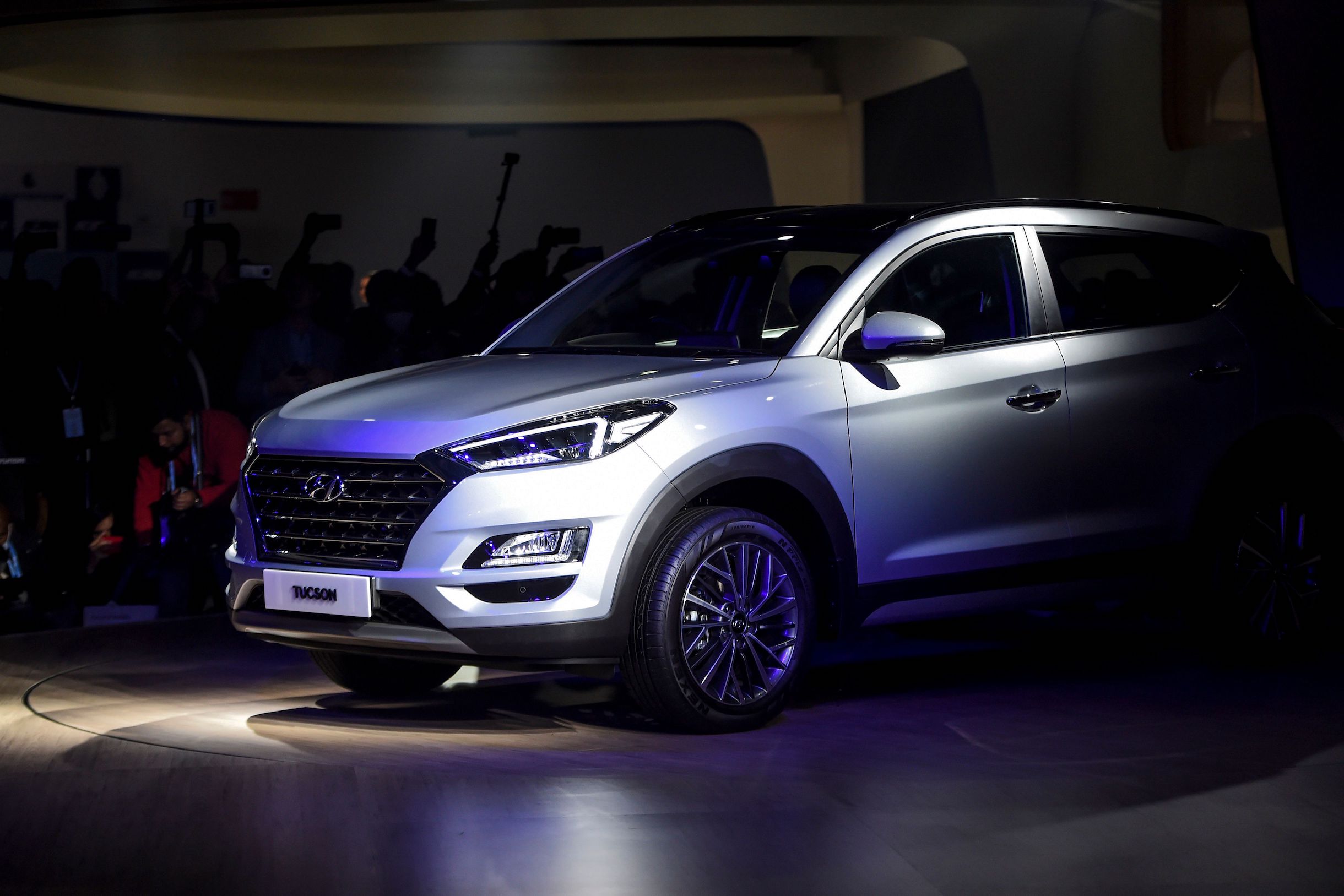 Hyundai Tucson car is displayed on stage after its launch at the Auto Expo 2020 at Greater Noida