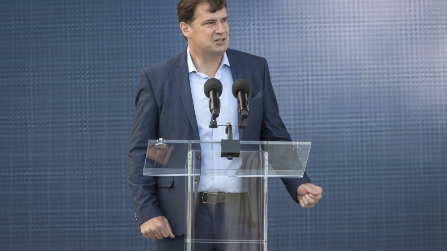 Ford CEO Jim Farley giving a speech at an event