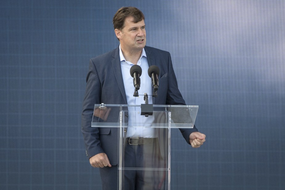 Ford CEO Jim Farley giving a speech at an event