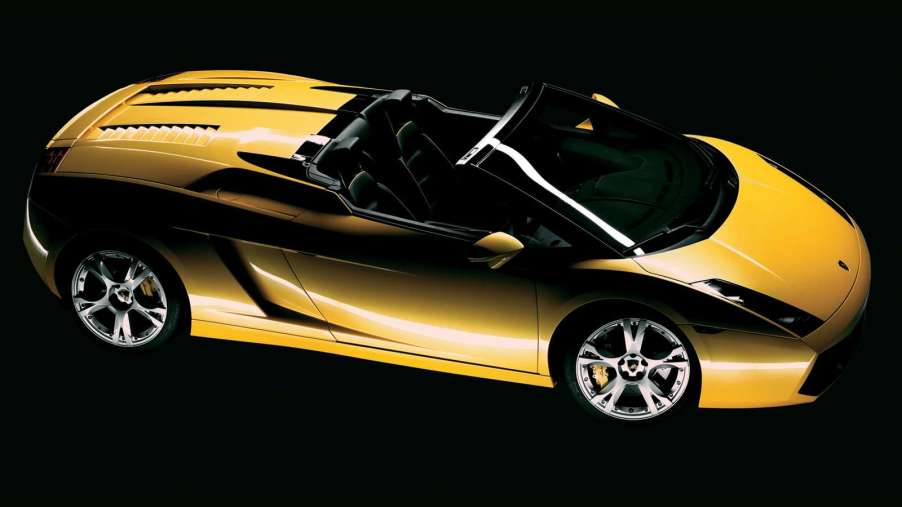 An image of a yellow Lamborghini Gallardo in a studio.