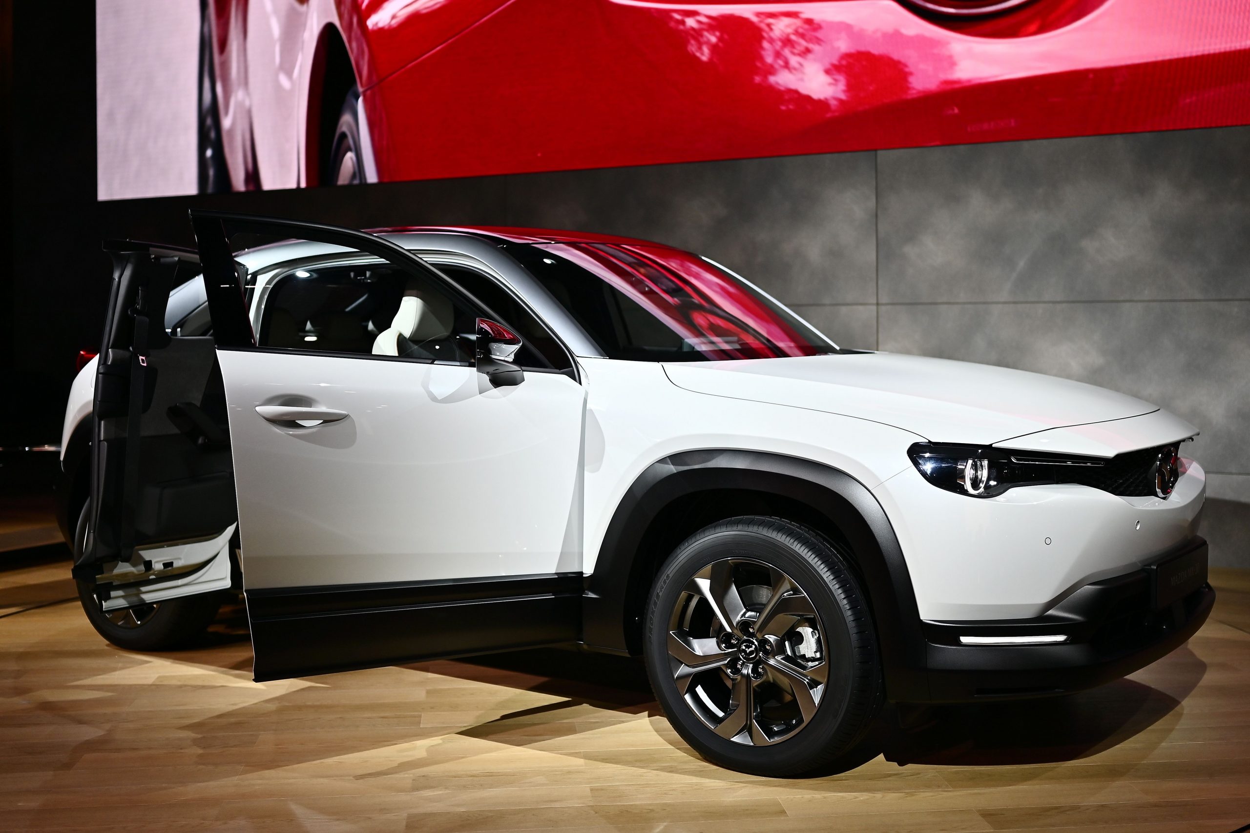 A white Mazda MX-30 electric SUV at the Tokyo Motor Show in Tokyo on October 25, 2019.