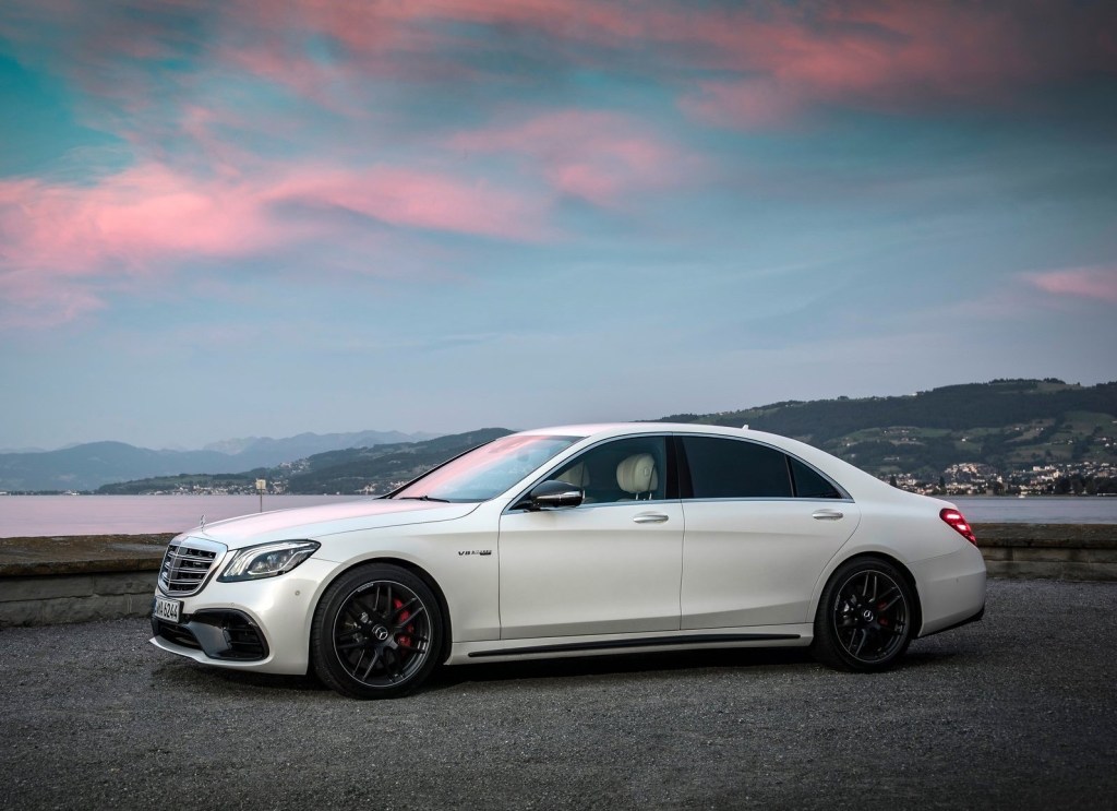 An image of a white Mercedes-Benz S63 AMG parked outdoors.