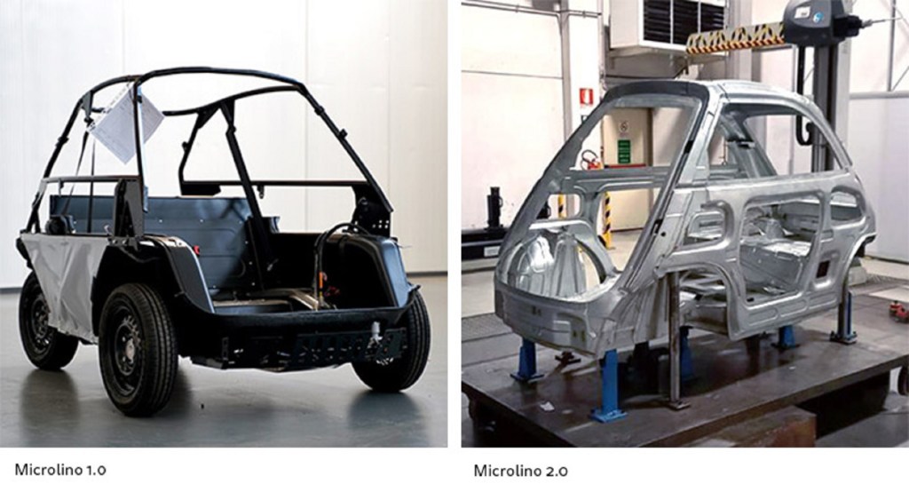 The black tubular chassis of the Microlino 1.0 next to the steel-and-aluminum monocoque of the Microlino 2.0