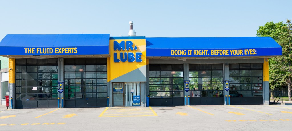 A bright blue Mr. Lube auto shop 