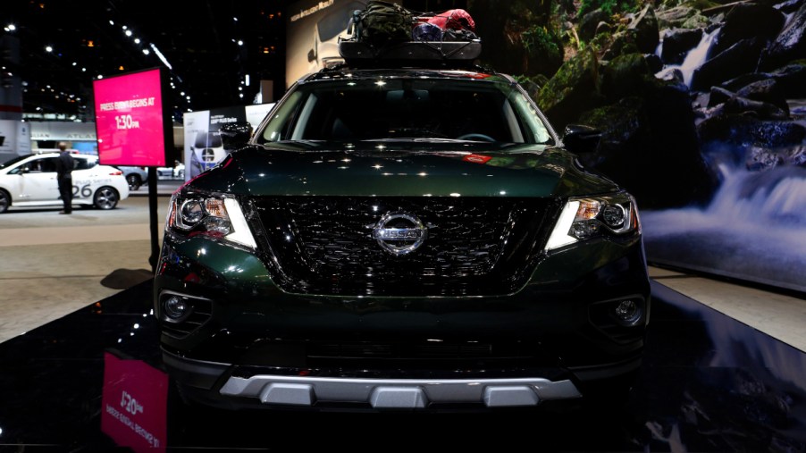 A Nissan Pathfinder on display at an auto show