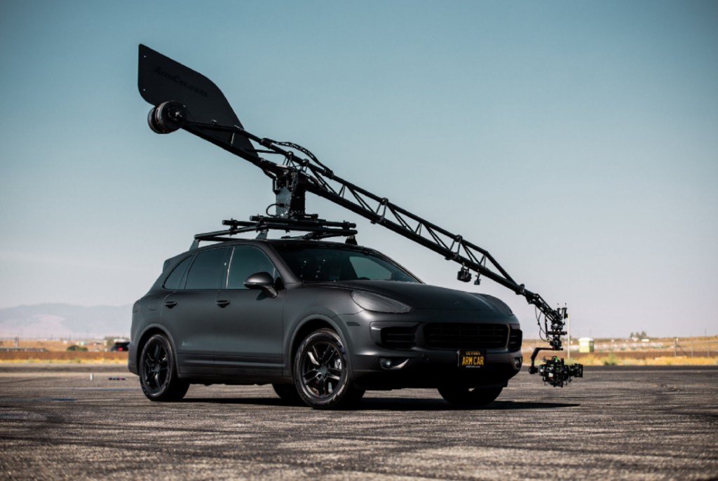 The matte-black Porsche Cayenne 'Arm Car' on a desert racetrack