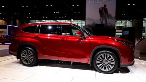 A Toyota Highlander Hybrid on display at an auto show