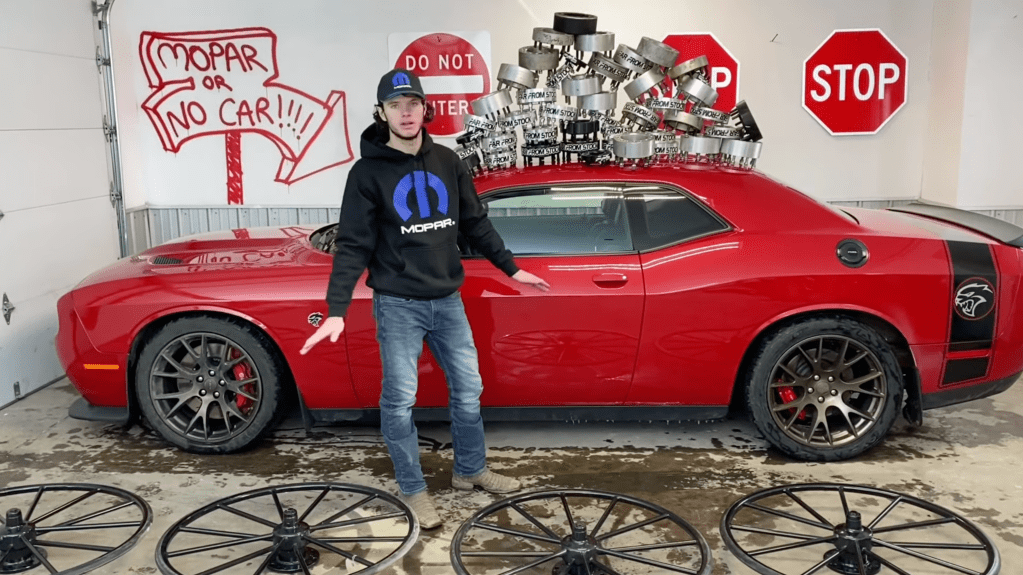 An image of a Dodge Challenger Hellcat with Buggy Wheels.