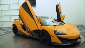 An image of a McLaren 600LT on display at a dealership.