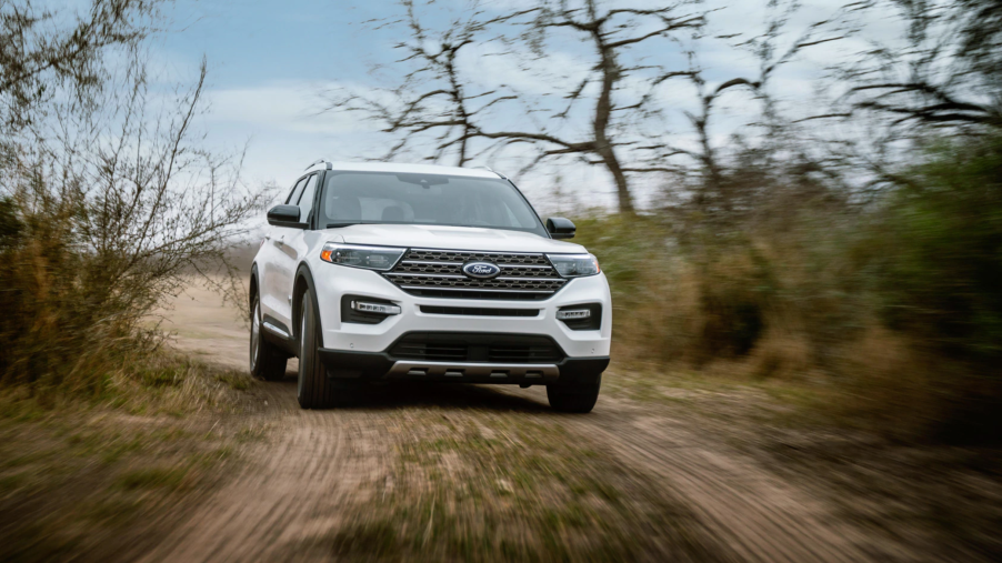 The 2021 Ford Explorer King Ranch edition driving on a dirt road