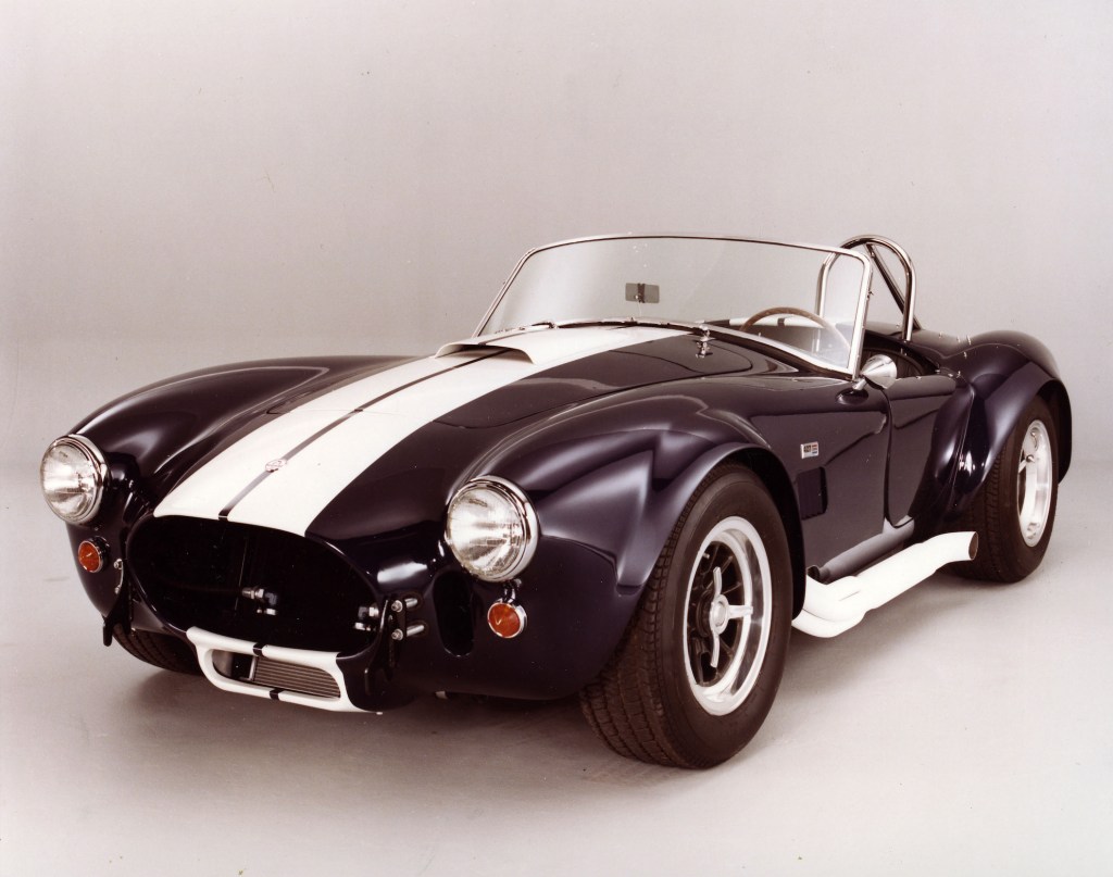 A blue and white Shelby Cobra Roadster
