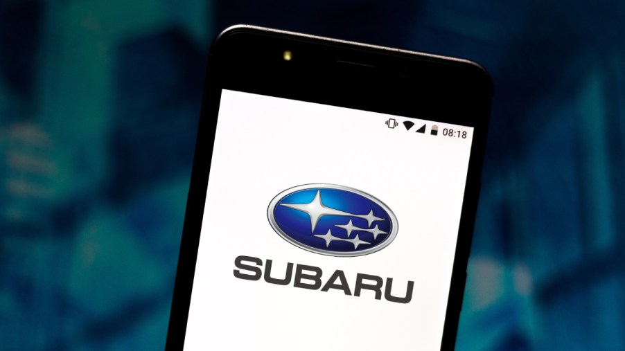 A Subaru logo displayed on a cell phone screen