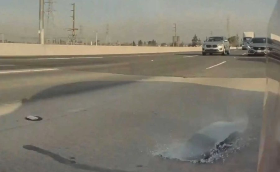 Tesla glass explodes onto freeway