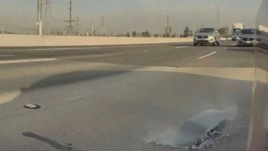 Tesla glass explodes onto freeway