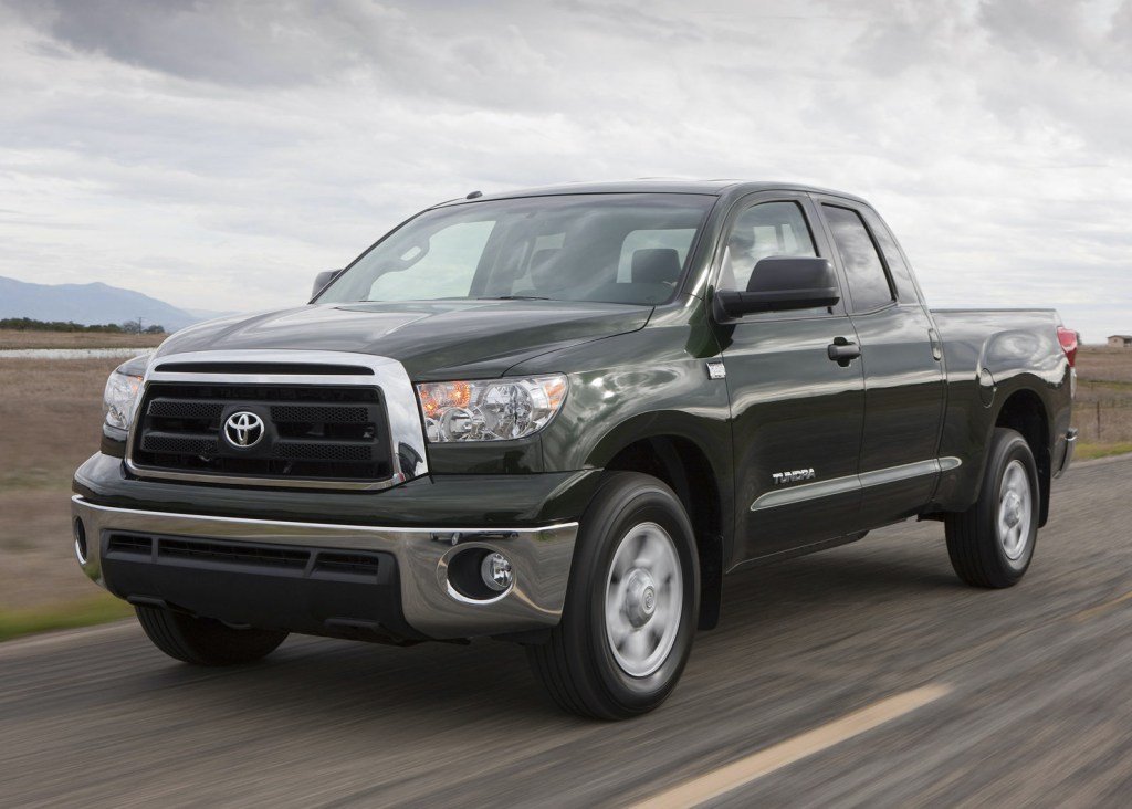 2010 Toyota Tundra in black cruising down the road