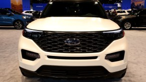 The front grille of a Ford Explorer on display at an auto show