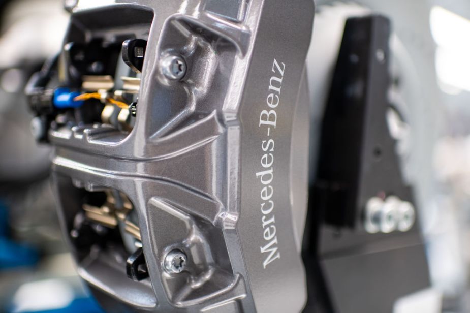 A close-up of a silver Mercedes-Benz brake caliper