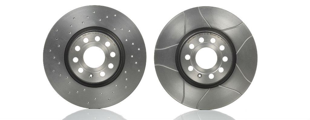 A visual comparison between drilled rotors and slotted rotors | Brembo