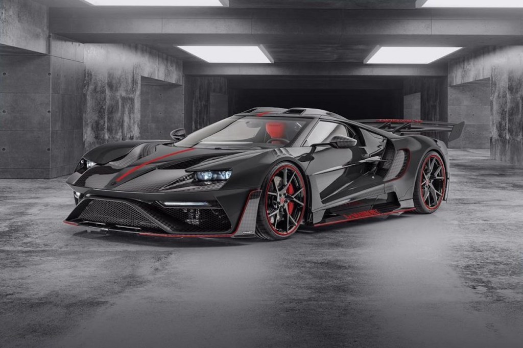 The Le Mansory #2 is in grey, black, and red in a garage 