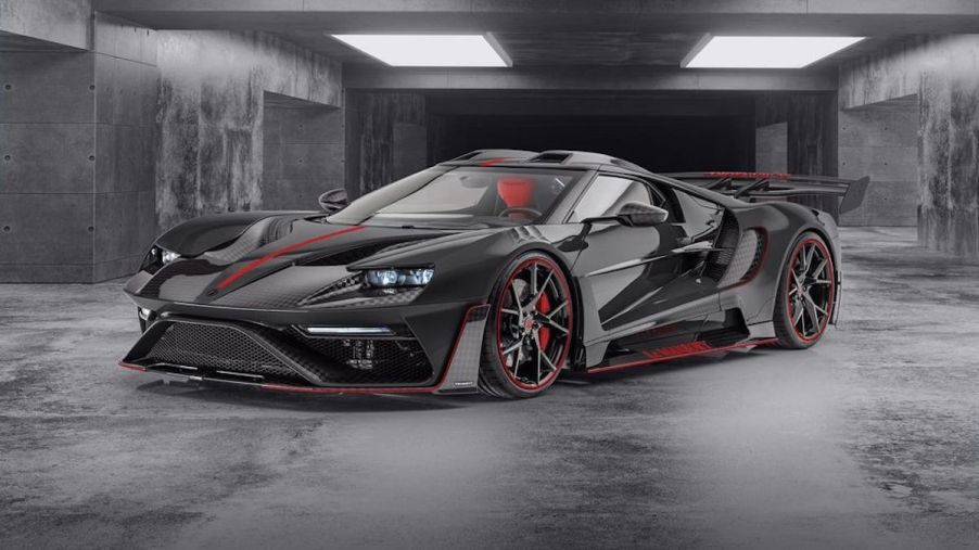The Le Mansory #2 is in grey, black, and red in a garage