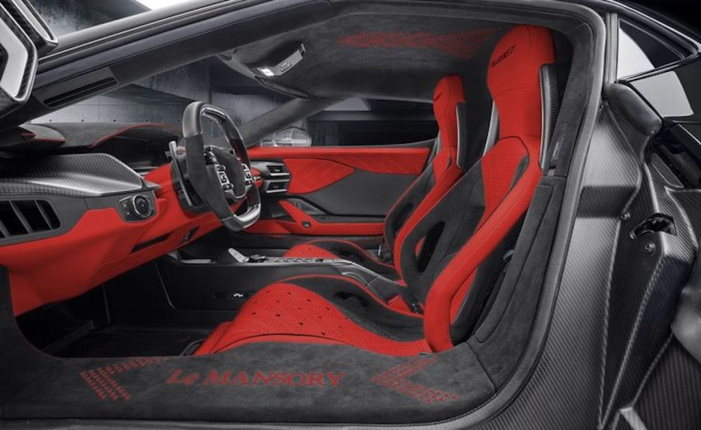 The Le Mansory #2 interior is in grey, black, and red in a garage