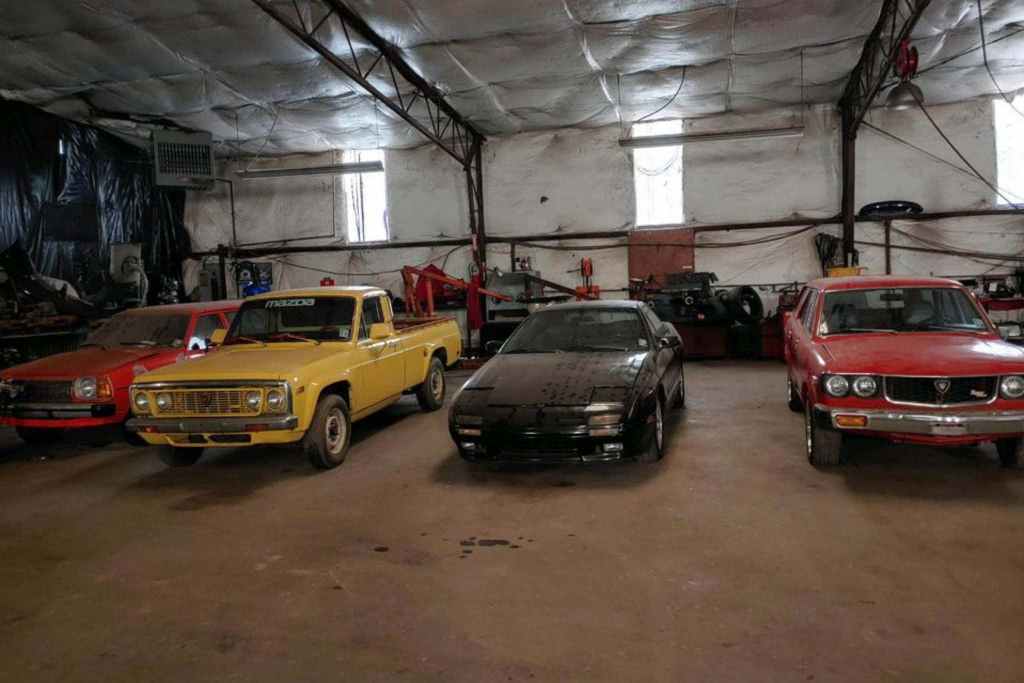 a few selections fomr the massive barn of rotary cars; a yellow mazda pickup and two other dusty finds. 