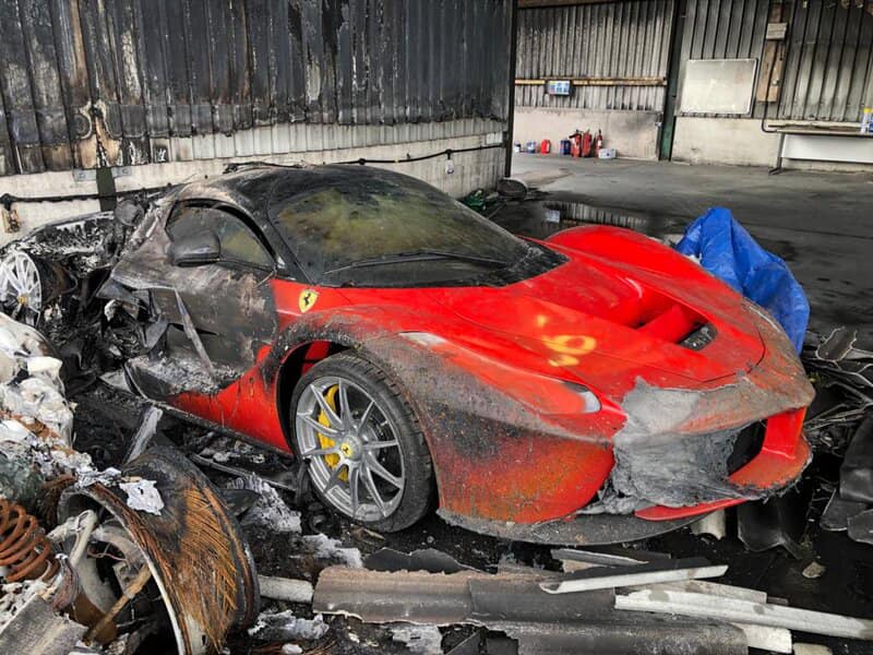 An image of a destroyed car collection featuring a Ferrari LaFerrari.