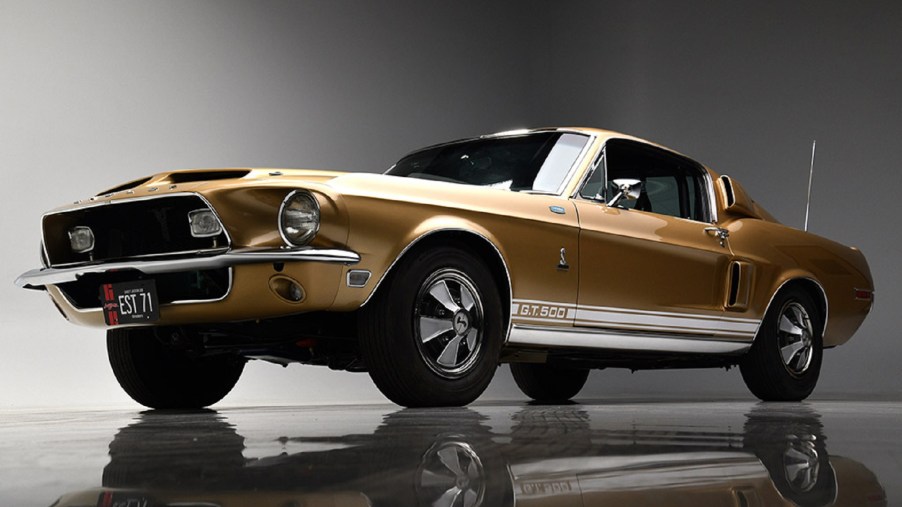 A low-angle shot of the gold-and-white 1968 Shelby GT500 Mustang EFI prototype
