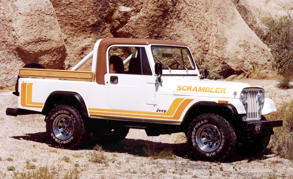1982 Jeep CJ-8 Scrambler parked near mountains 