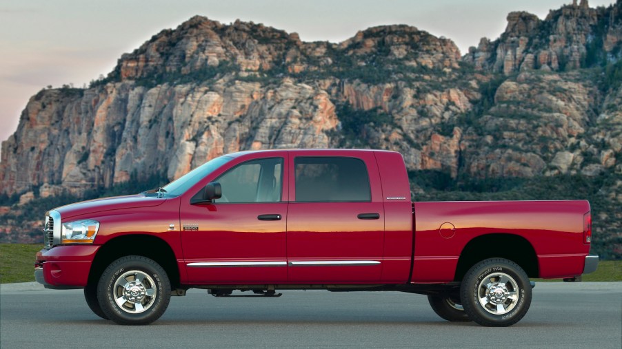 A red 2008 Dodge Ram diesel pickup with a manual transmission