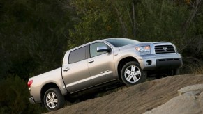 2008 Toyota Tundra driving up a grassy hill