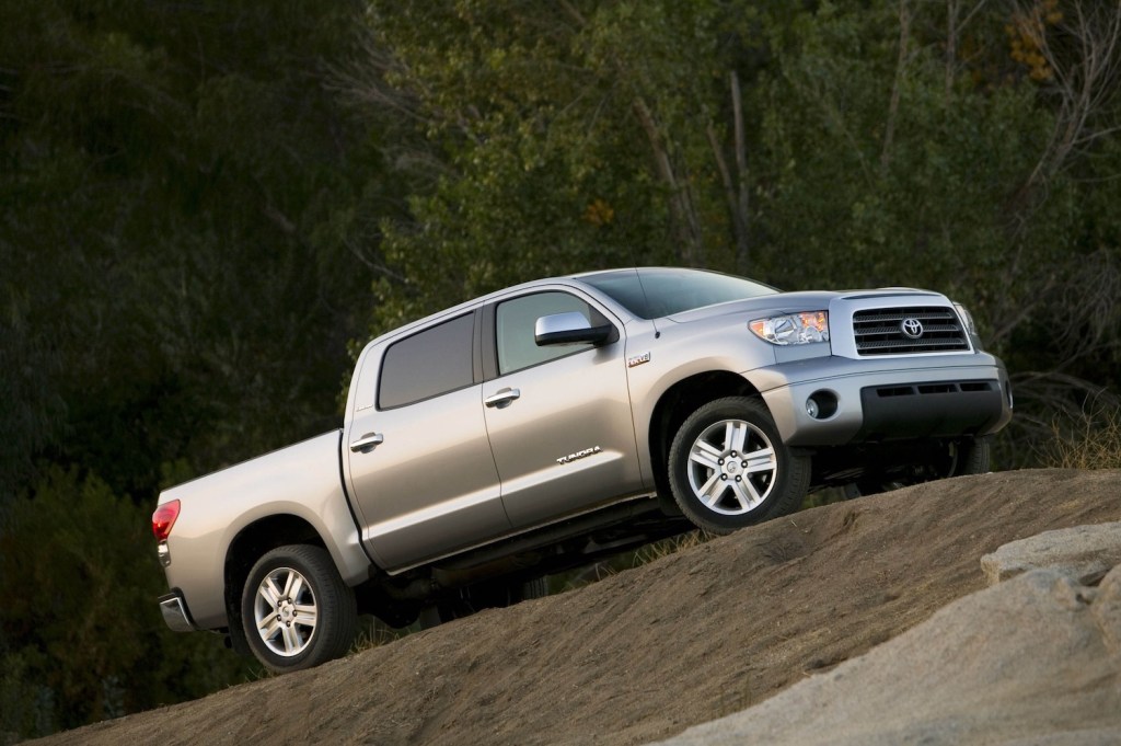 2008 Toyota Tundra driving up a grassy hill