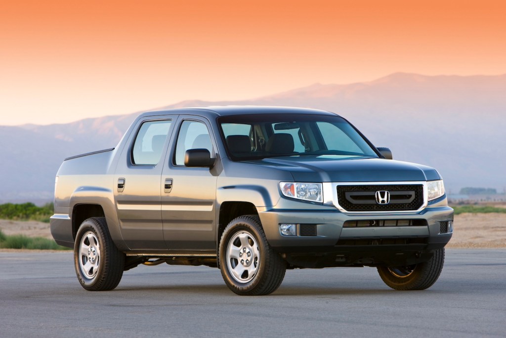 2009 Honda Ridgeline RT parked at sunset