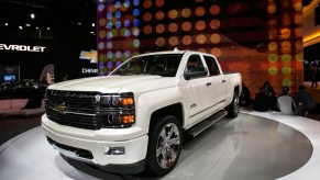 A white 2015 Chevrolet Silverado sits on display at the North American International Auto Show