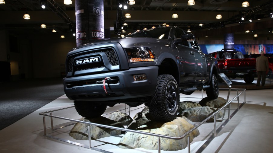 A 2017 Ram 1500 sits on a rock display at the New York International Auto Show