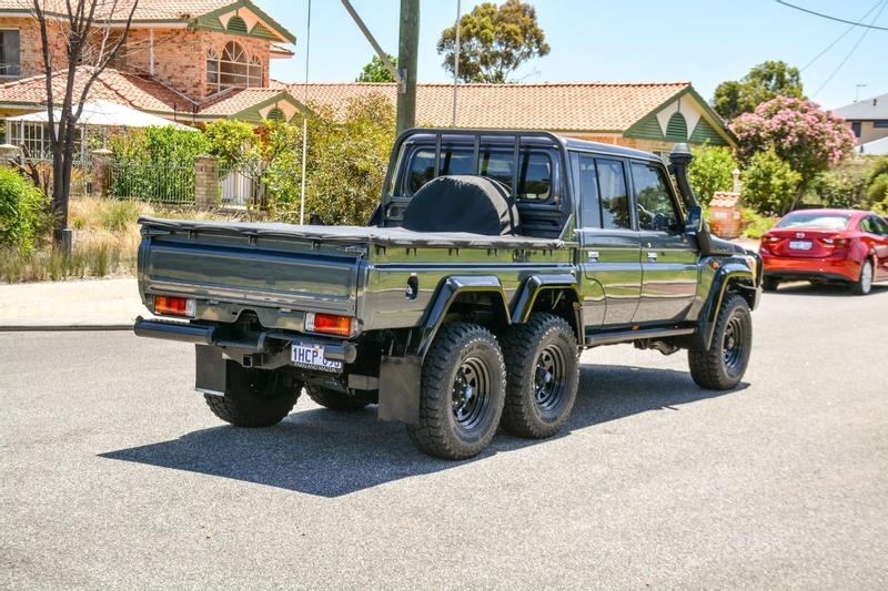 An image of a Toyota Land Cruiser 6x6 parked outside in Australia.