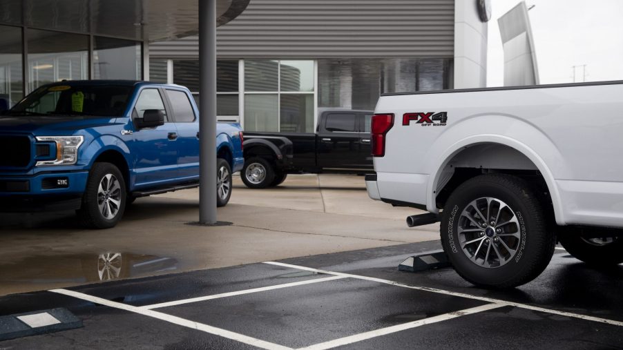 2020 Ford Motor Co. F-150 trucks sit outside the showroom at a car dealership in Peoria, Illinois, U.S.