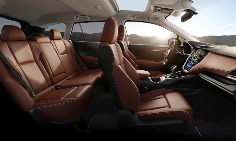 The tan leather interior of a 2020 Subaru Outback Touring midsize crossover SUV