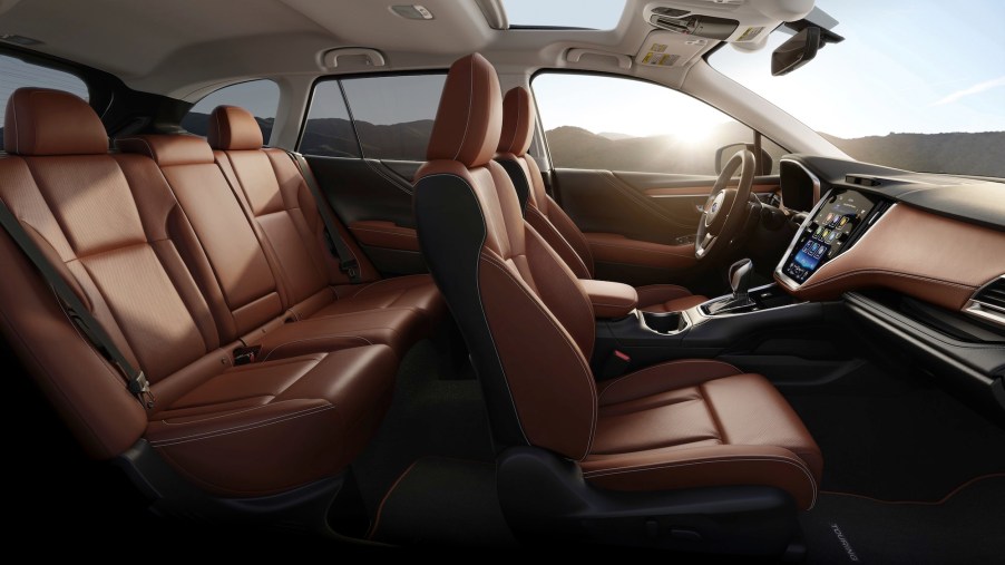 The tan leather interior of a 2020 Subaru Outback Touring midsize crossover SUV