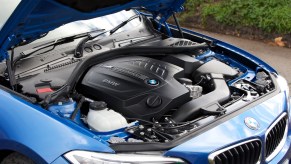 Under the hood of a blue 2021 BMW 2 Series Coupé