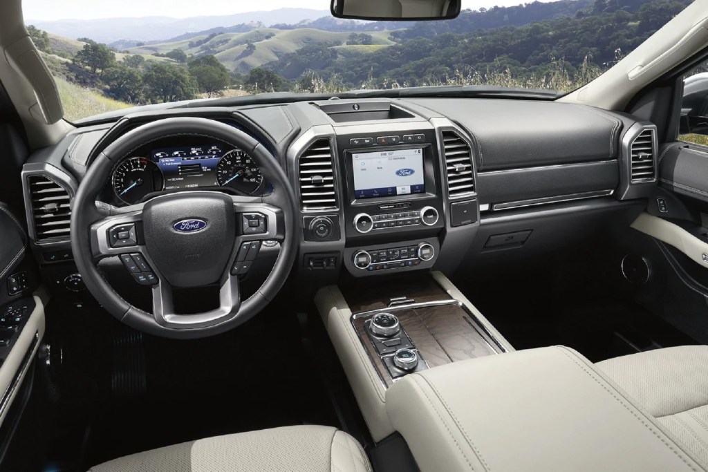 The white-leather and black-leather dashboard of a 2021 Ford Expedition Platinum