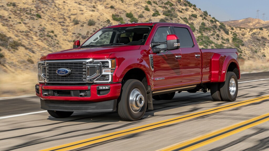The 2021 Ford F-350 Super Duty truck driving down the road
