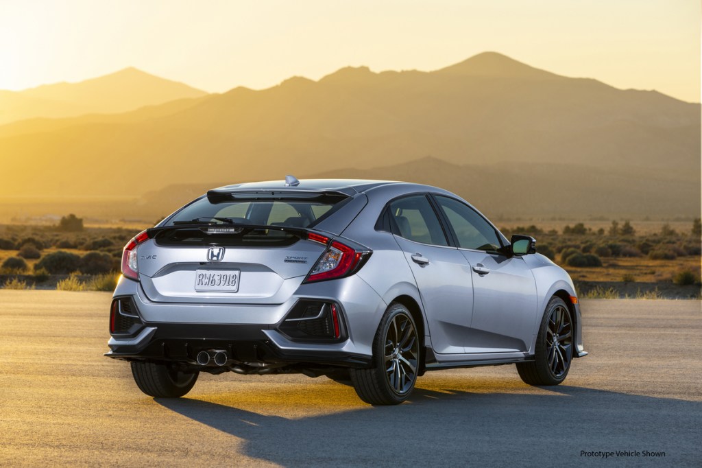 a rear shot of the 2021 Honda Civic Hatchback Sport Touring in the sunset