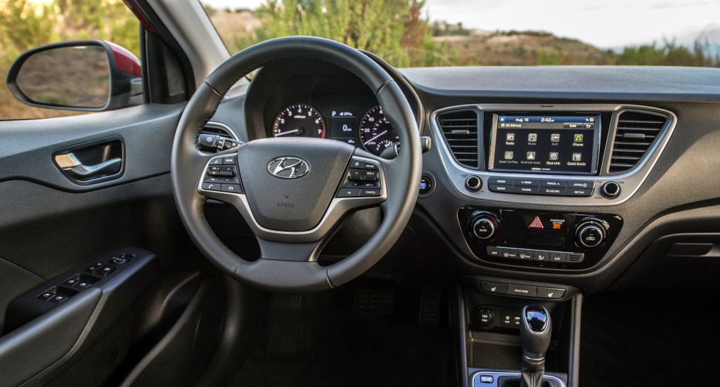 A look at the interior of the 2021 Hyundai Accent, including the steering wheel and infotainment system