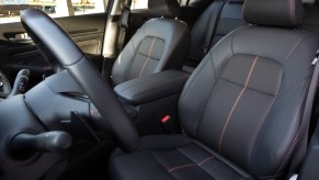 The black-leather seating inside a 2021 Nissan Altima midsize sedan