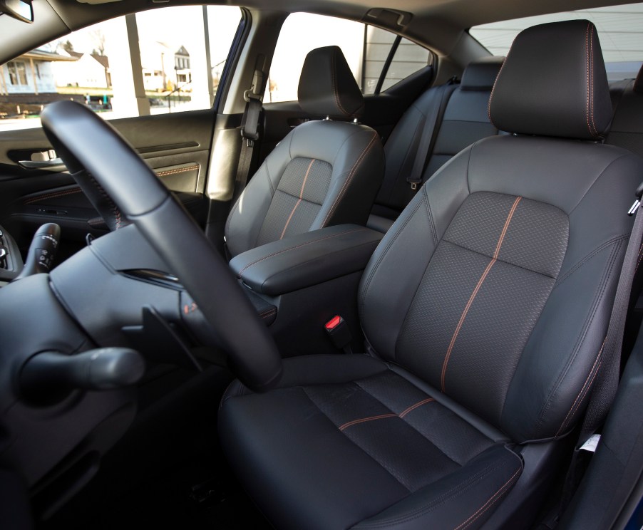 The black-leather seating inside a 2021 Nissan Altima midsize sedan