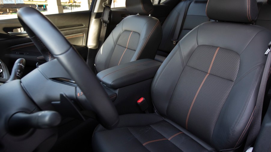 The black-leather seating inside a 2021 Nissan Altima midsize sedan