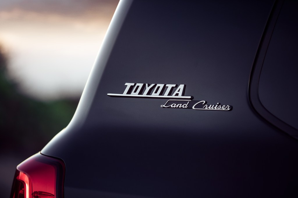 A close-up look at the signature badge of the 2021 Toyota Land Cruiser