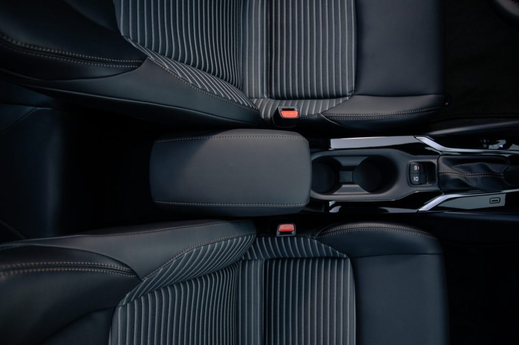 Black leather and stripe interior of the 2011 Toyota Camry